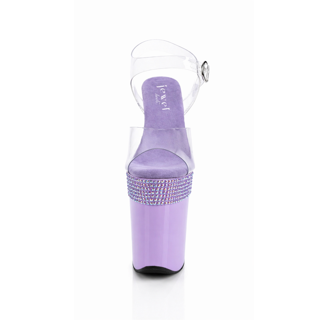 Purple high-heeled sandal with clear heel and rhinestone details on a white background